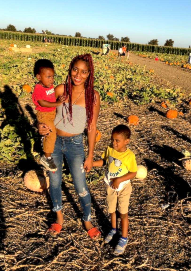 Chloe Durant with her two sons at the pumpkin patch