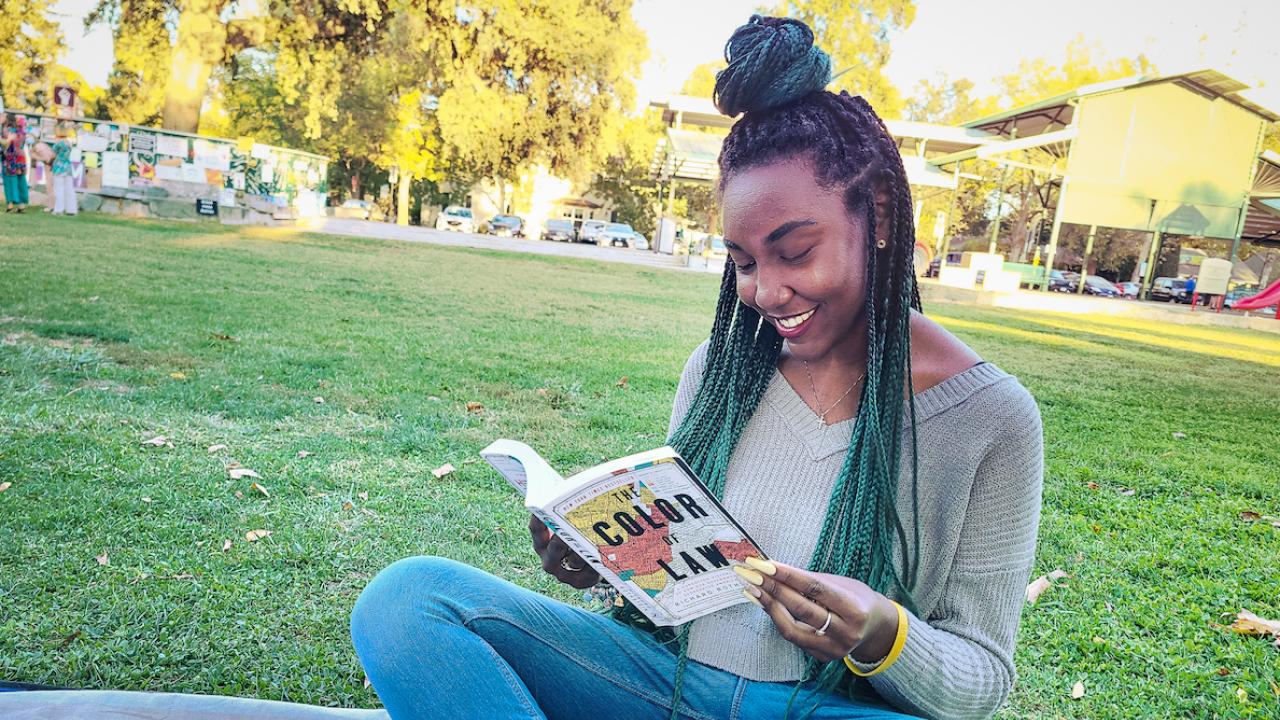 kyerah Kyles reads The Color of Law for her Transformative Justice Studies program.