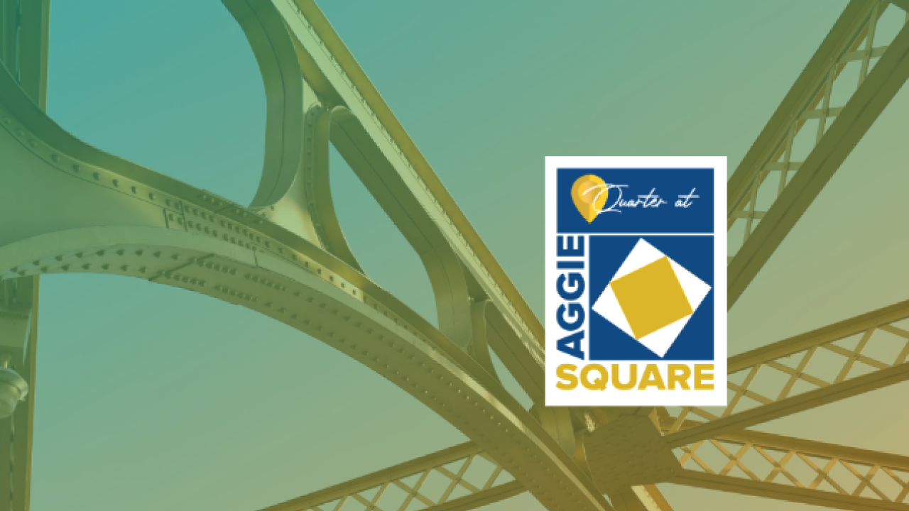 The Quarter at Aggie Square is in the forground of a close up photo of the draw bridge in downtown Sacramento.