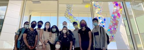 Group of students in front of DNA sculpture at UC Davis Health