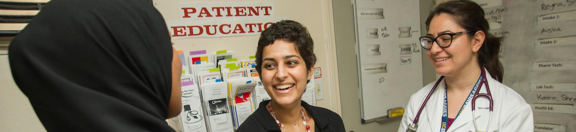 Student with medical interns at Shifa Clinic